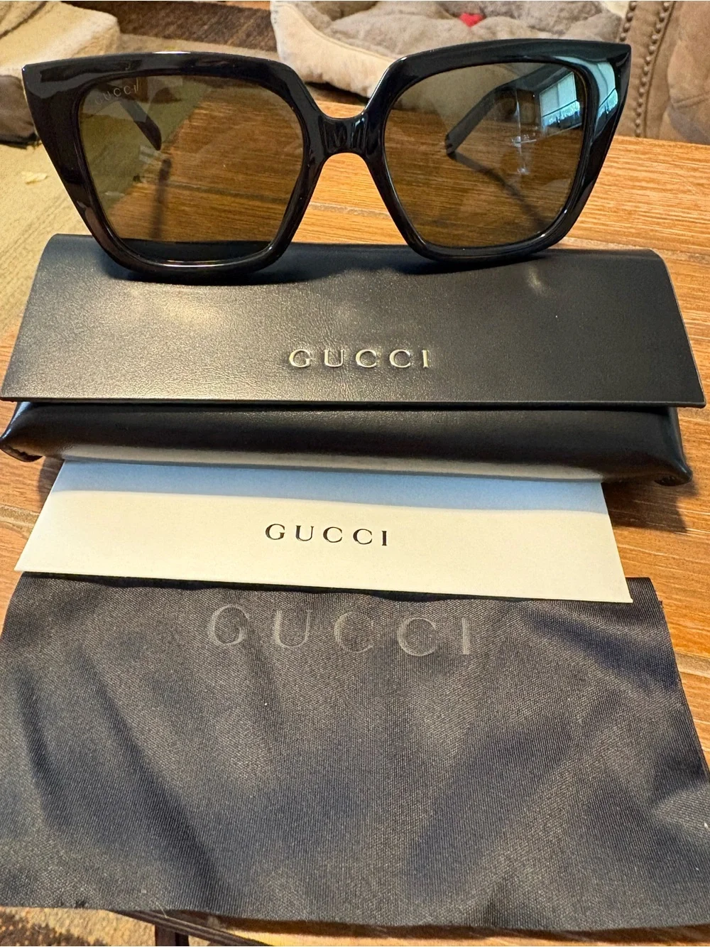 Gucci Men’s Black Frame Sunglasses with Brown Lenses